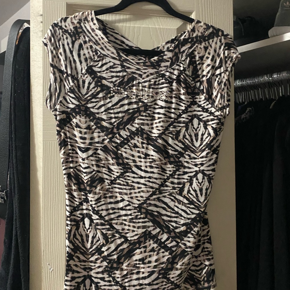 Bebe logo top